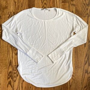 White Athleta rounded hem long sleeve shirt, size S. Great condition some pill